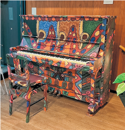 ピアノを丸ごとラッピング